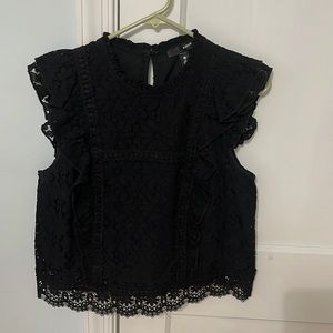 Ruffled sleeveless top